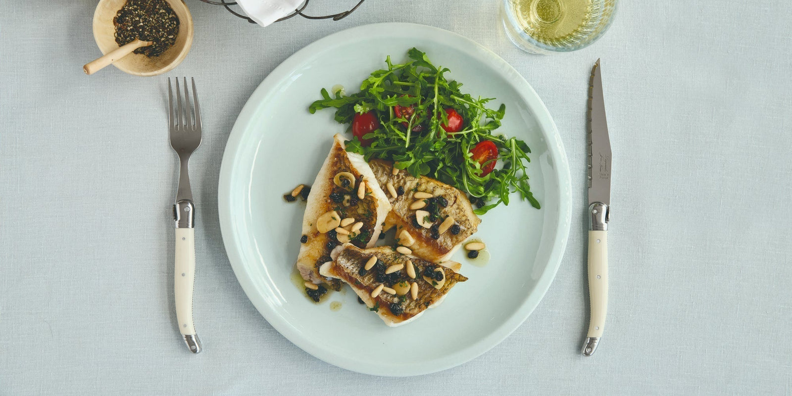 Pan-seared fish fillets with agrodolce sauce