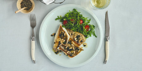 Pan-seared fish fillets with agrodolce sauce