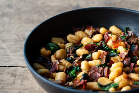 Gnocchi with Duck Master Stock, Spinach and Prosciutto