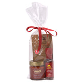 A gift set of hot sauce and jar of nduja in a clear cellophane bag tied with a red ribbon. Sabato | Auckland, New Zealand.